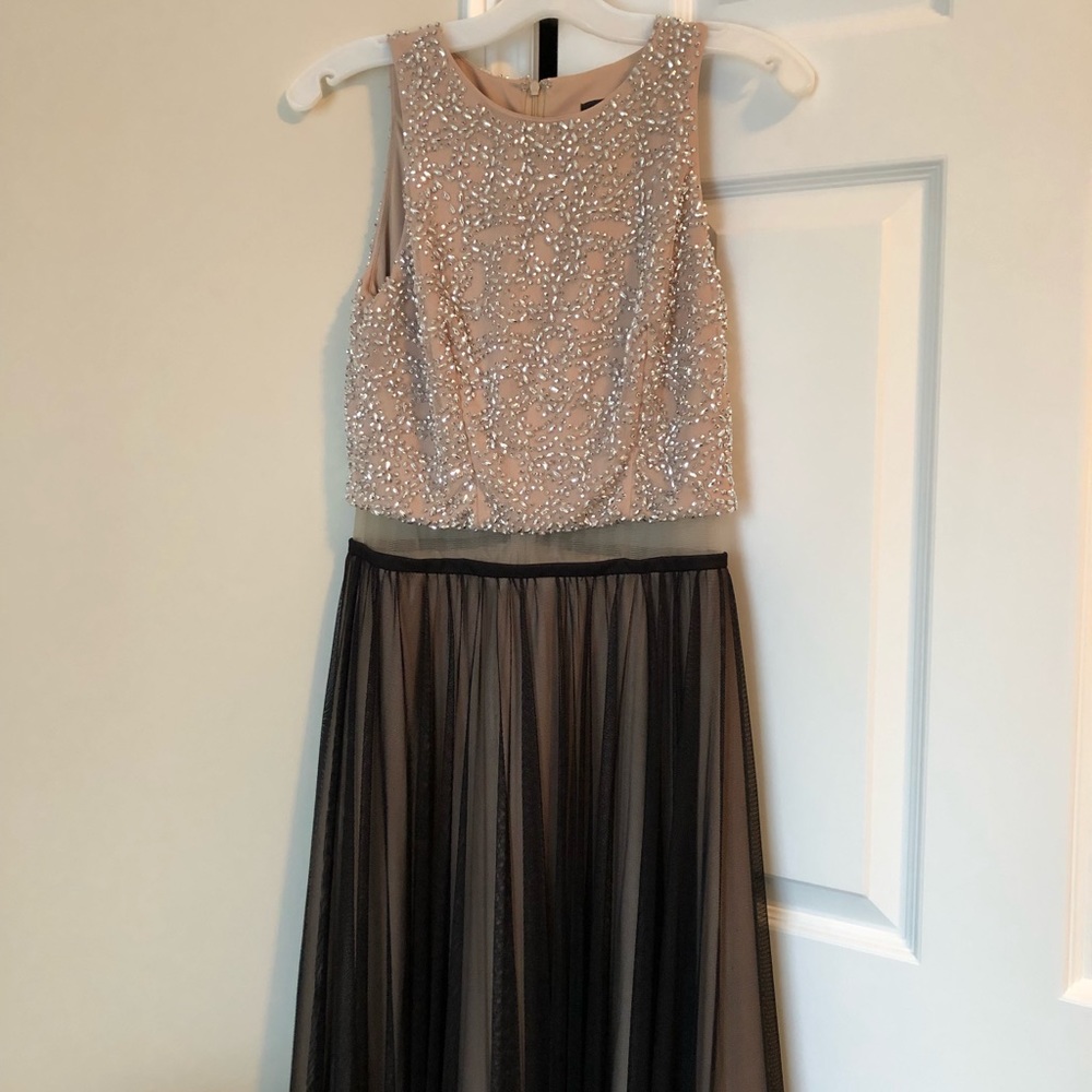Nude and black prom dress